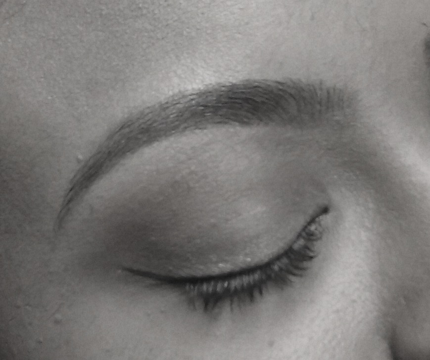 Real BROWDOC client portfolio photo showing a soft, shaped eyebrow