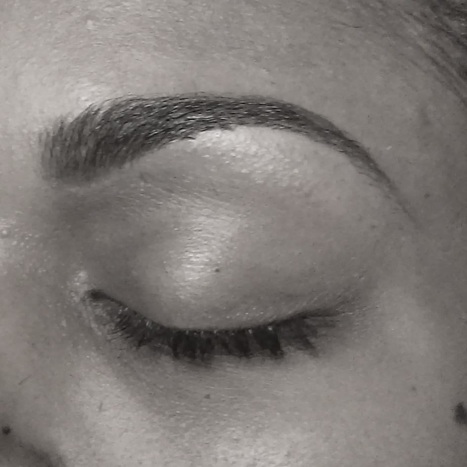 Real BROWDOC client portfolio close-up of a full, groomed natural brow
